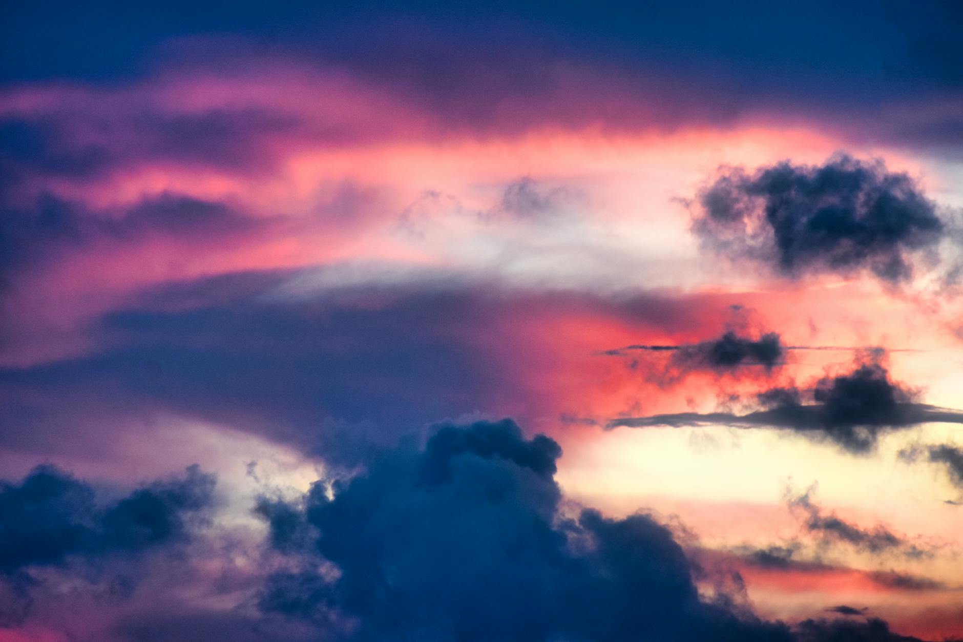 Purple and blue clouds symbolizing hope and healing